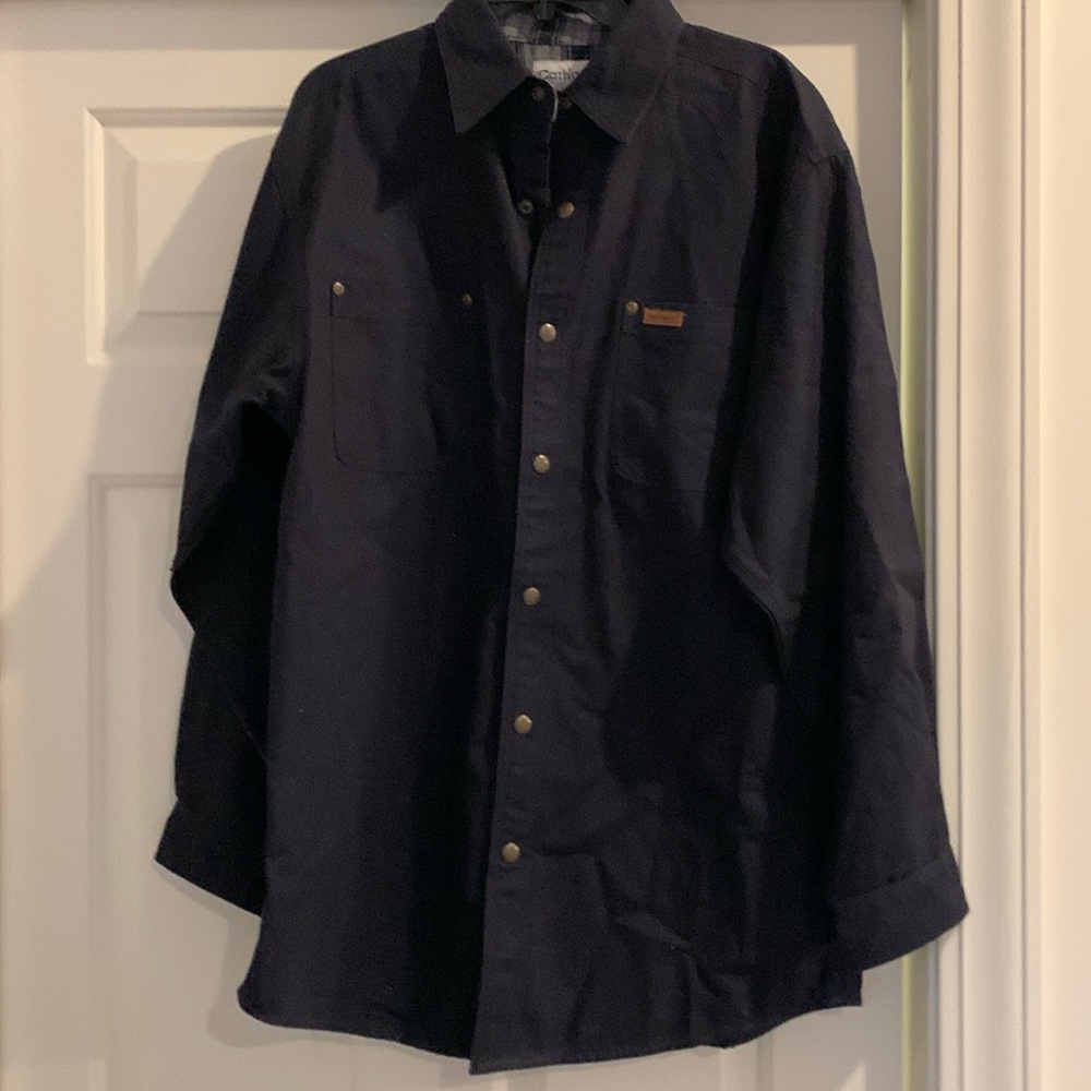 Carhartt lined shirt. Navy with a plaid lining size medium.

P
